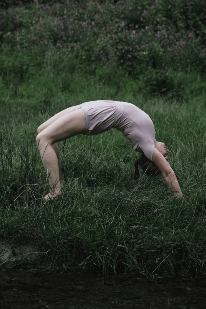 Elena Rodchenko practicing Iyengar Yoga in a natural setting in Edinburgh